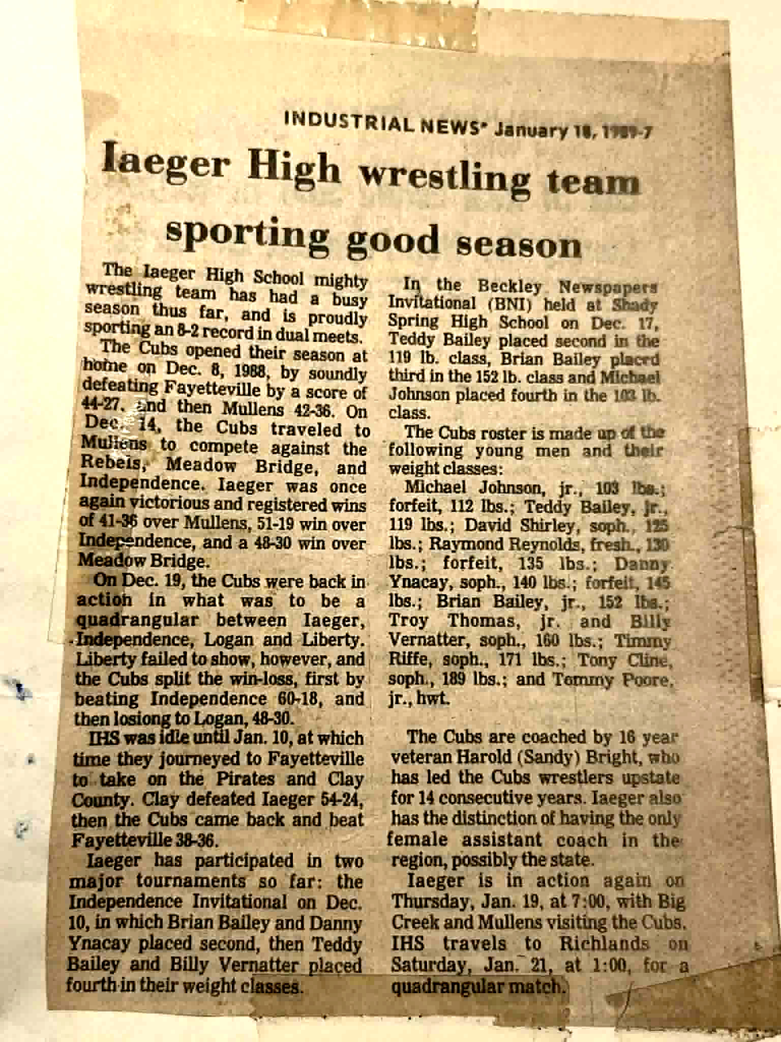 Aged newspaper clipping titled “Iaeger High wrestling team sporting good season,” naming members of the 1988–1989 Iaeger High School wrestling team and coach Harold “Sandy” Bright.